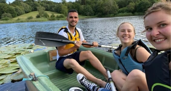 Group in a canoe at Ashburnham Place