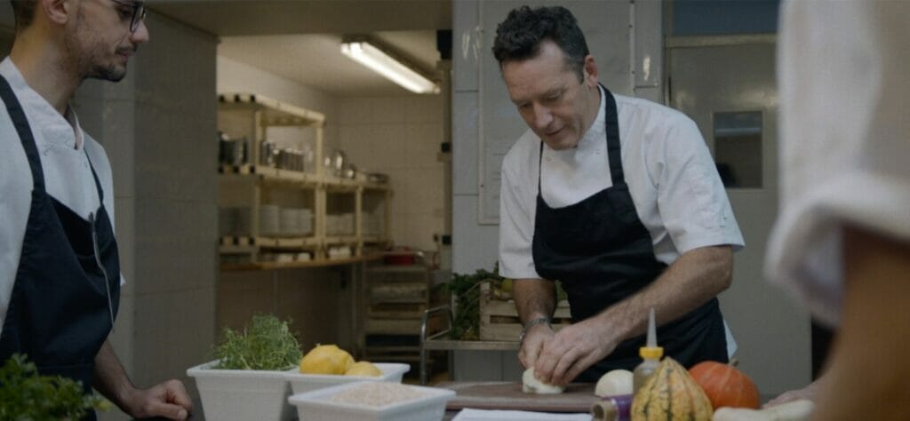 Chef cooking food in kitchen